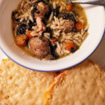 italian wedding soup with cheesy garlic bread